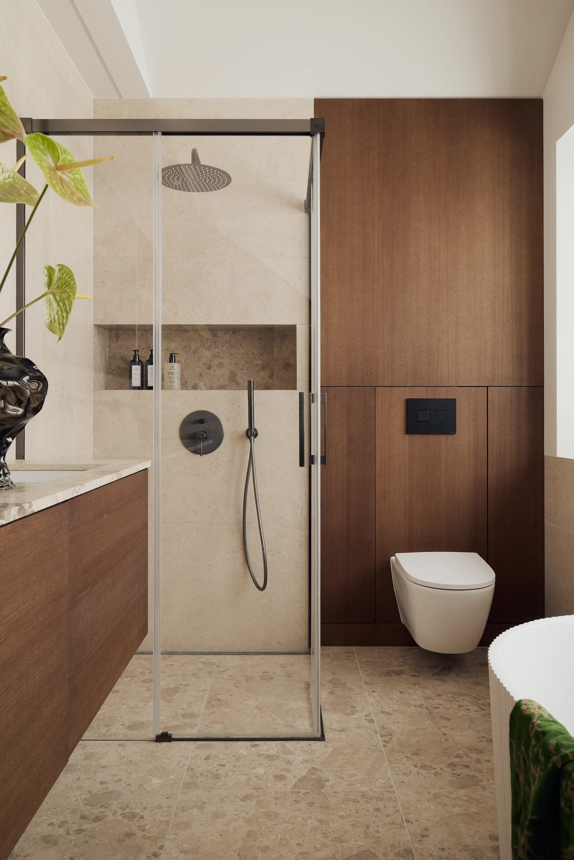 Brown oak cabinetry with refined hardware and warm tonality
